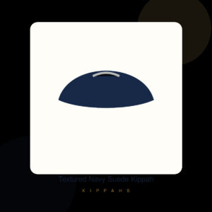 Textured Navy Suede Kippah shown in a premium ivory, deep navy, and antique gold Judaica product setting